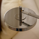 UMAGE_lifestyle_Asteria_wall lamp_short_polished steel_(4).jpeg