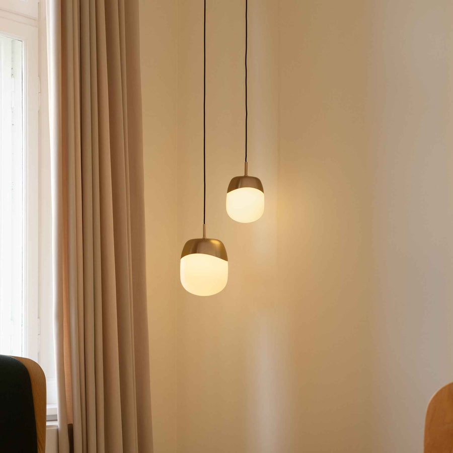 UMAGE_lifestyle_Spring_pendant lampshade_medium_mini_brass_(2).jpeg